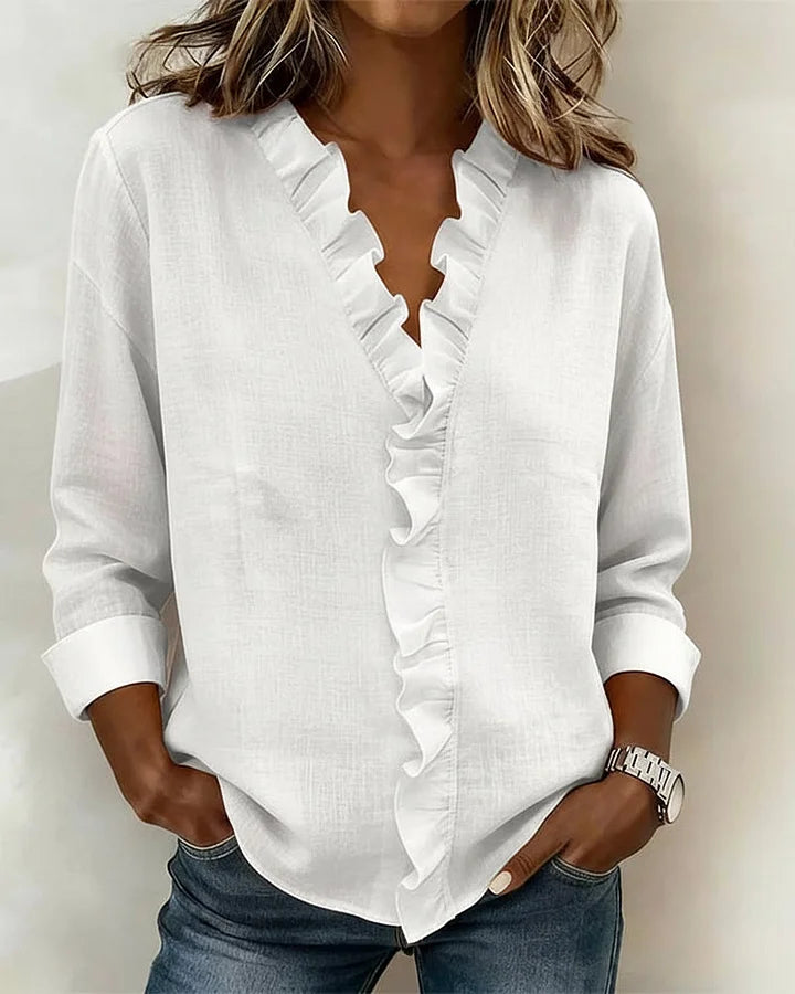 SARA | Blusa con scollo a V e volant delicati