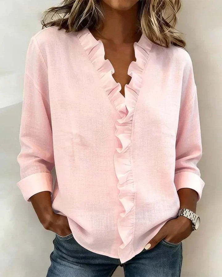 SARA | Blusa con scollo a V e volant delicati
