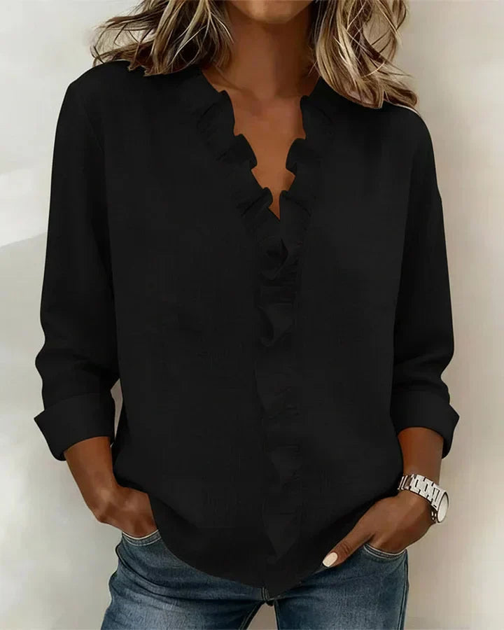 SARA | Blusa con scollo a V e volant delicati