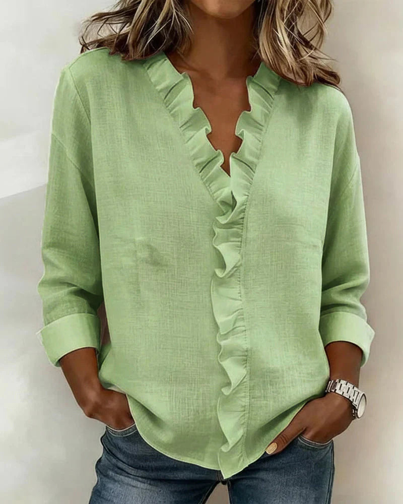 SARA | Blusa con scollo a V e volant delicati