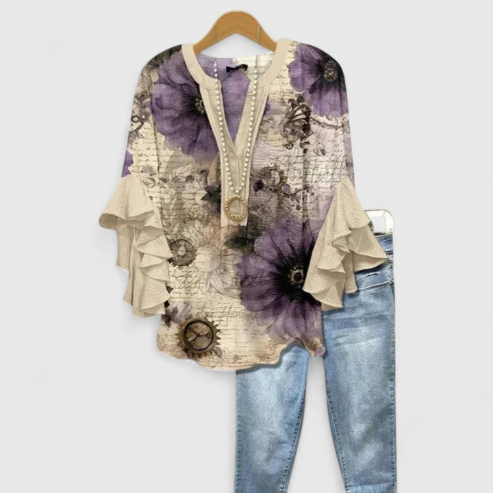 Aurelia – Blusa elegante con maniche a volant
