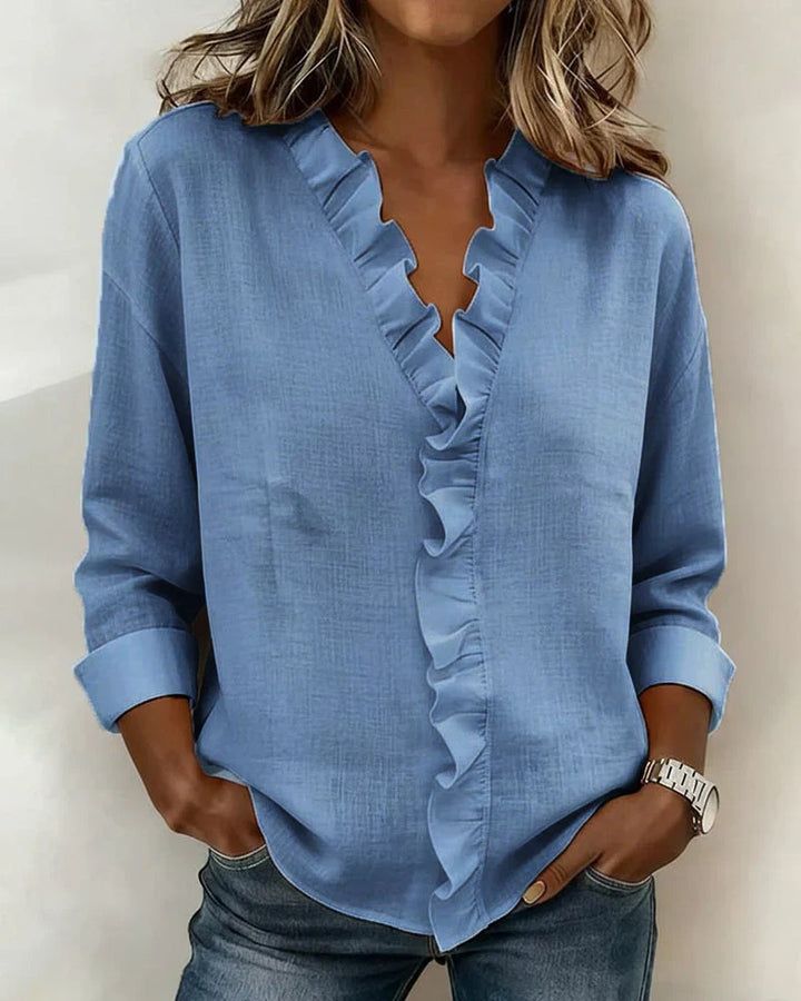SARA | Blusa con scollo a V e volant delicati