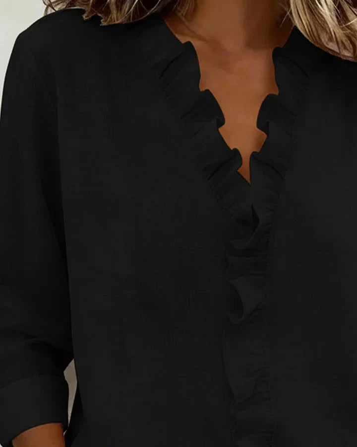 SARA | Blusa con scollo a V e volant delicati